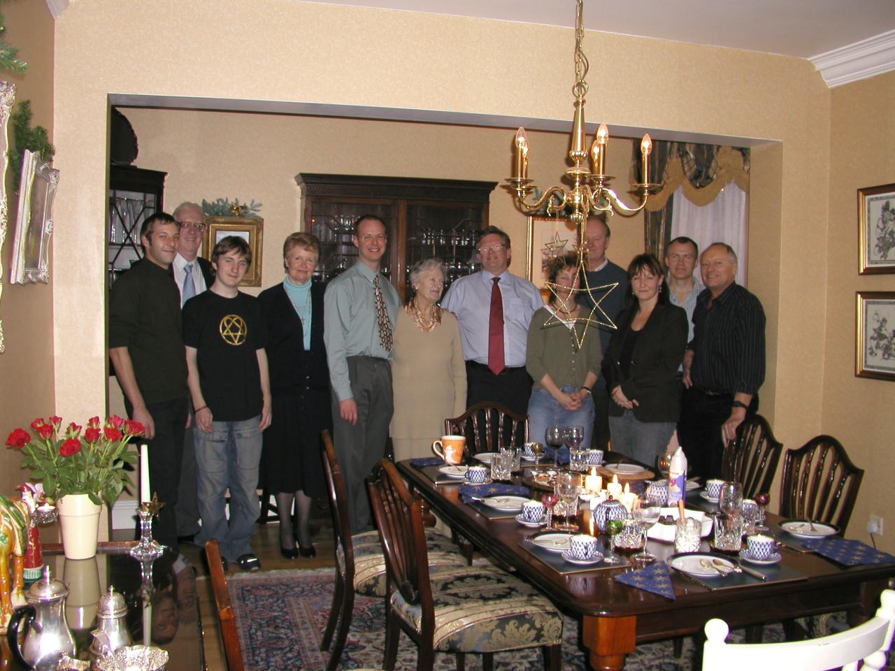 JPEG image - The family gathered, but slightly obscured by Christmas decorations! ...