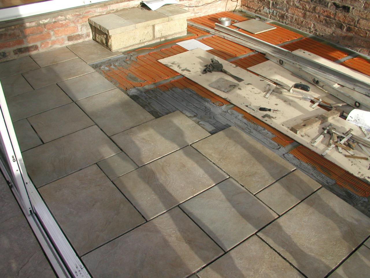 JPEG image - 20th Jan: Almost a third of the tiling done: looks as if they will go quite well with the old concrete - once they have been grouted in grey.  ...
