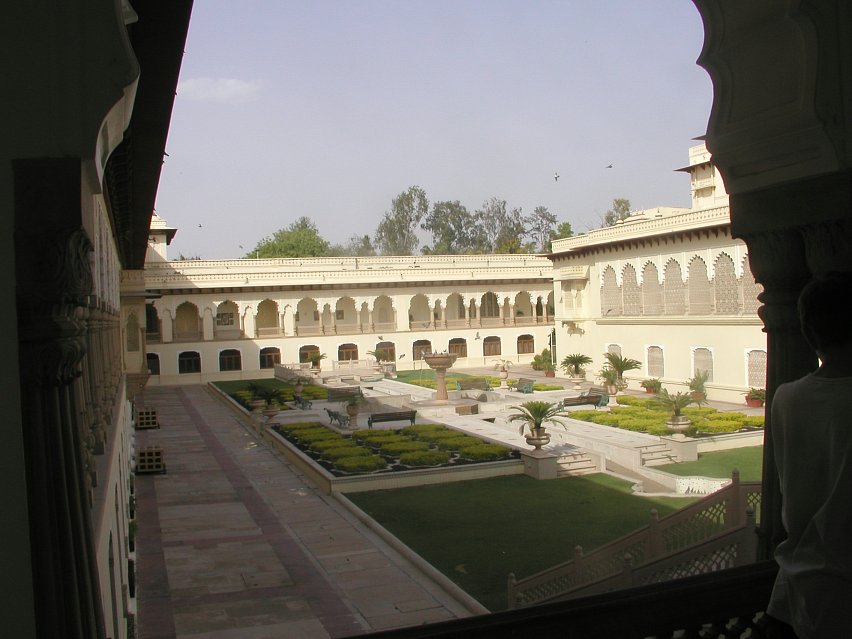 JPEG image - Inner courtyard of the Rambagh Palace. It used to be the palace home of the Maharajah of Jaipur, his widow still lives here in a suite of rooms ...