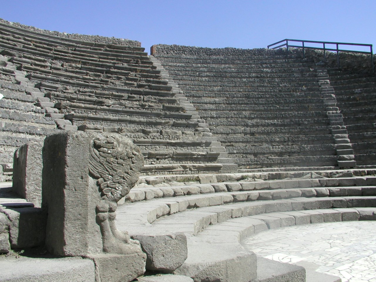 JPEG image - Pompei : We spent a good four hours walking round the site. It was a larger city than I had imagined. There is still around a third to be excavated yet. This was the smaller of two theatres and was used for plays, poetry readings, etc. ...