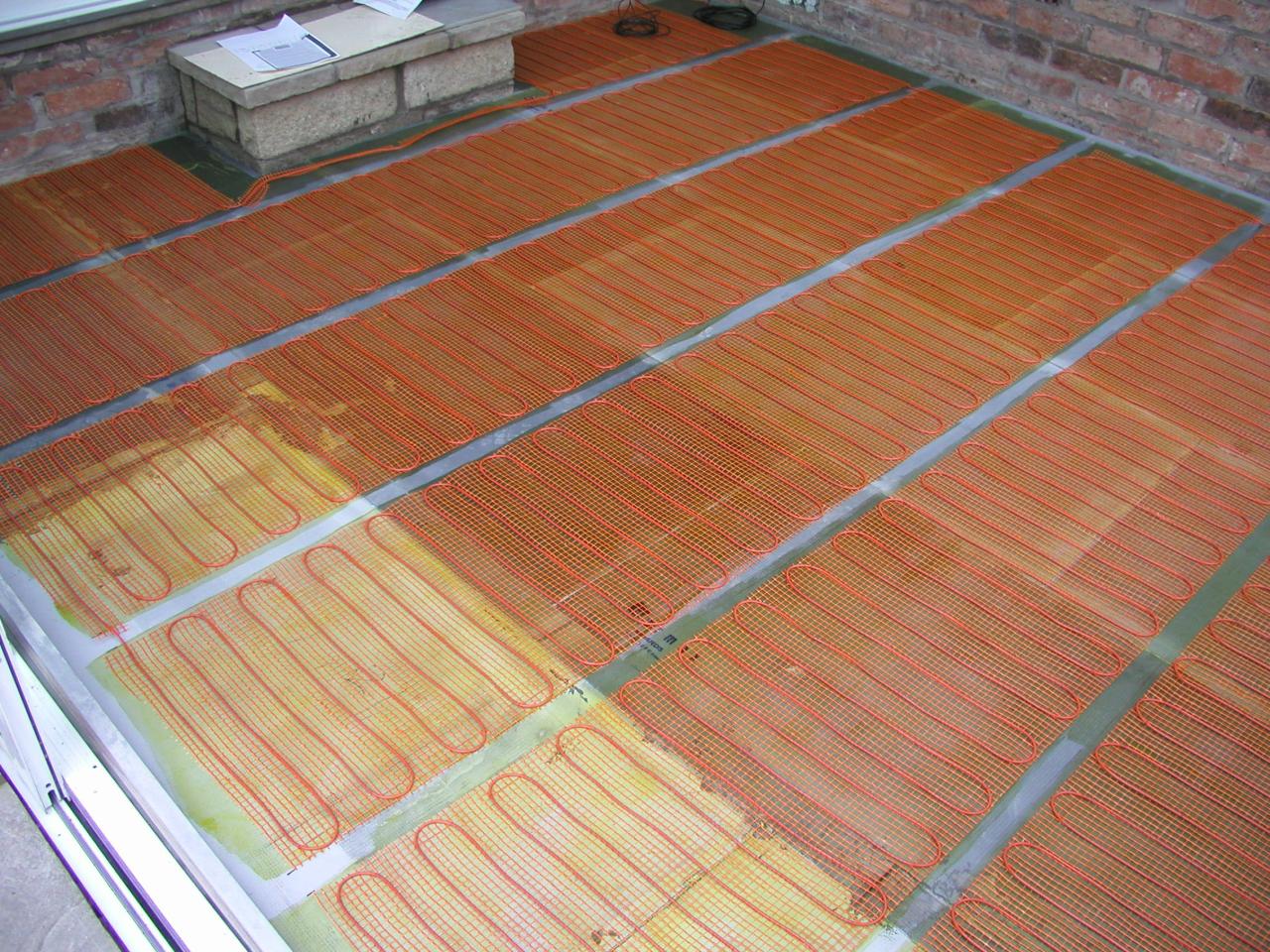 JPEG image - 19th Jan: The 16m x 50cm 1600w heating mat cut and stuck down. ...